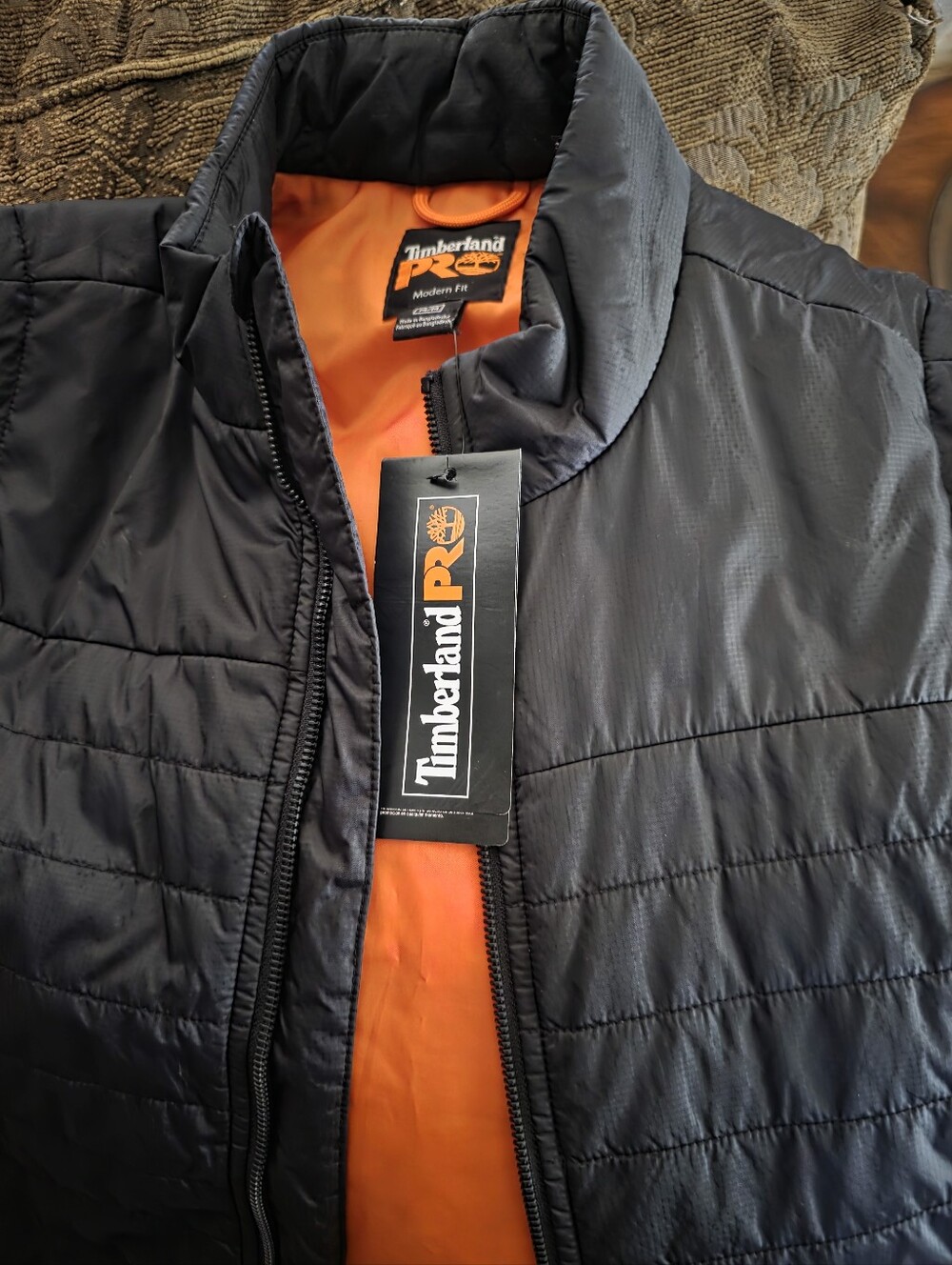 Timberland PRO Men's Black Puffer Jacket with Orange Interior